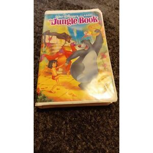 Disney's vintage black diamond jungle book and Aladdin on VHS. Good working cond